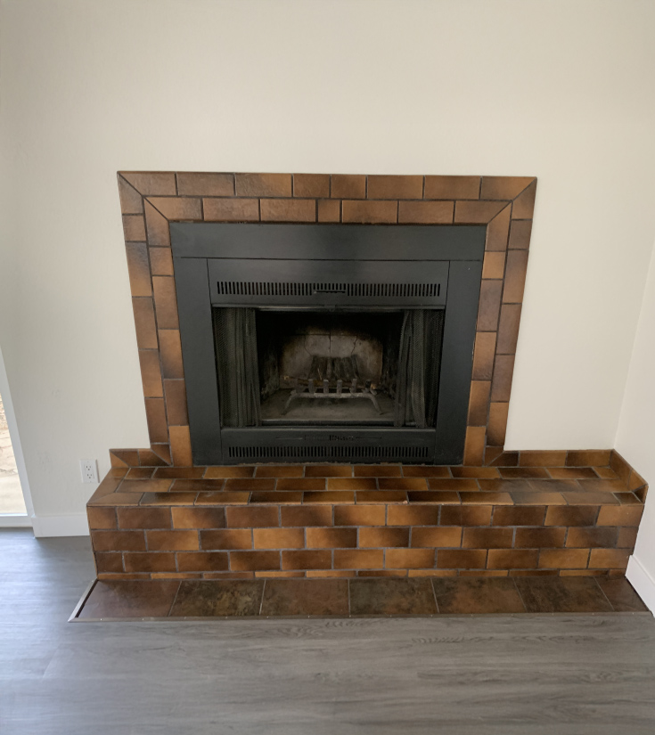 Tile fireplace before